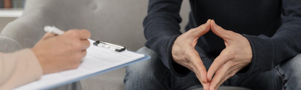 man-talking-therapist